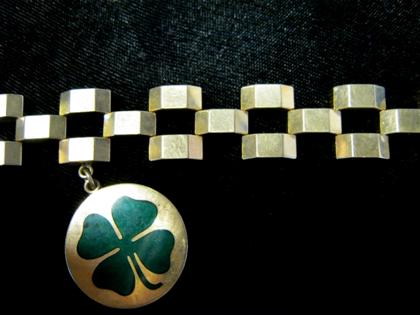 Appraisal: karat gold bracelet and shamrock charmBrick link form green enameled