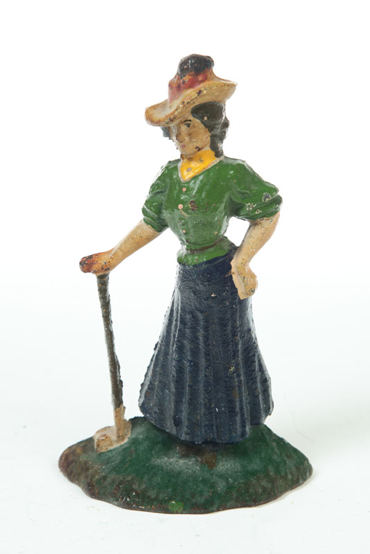 Appraisal: CAST IRON DOORSTOP American early th century Woman golfer with