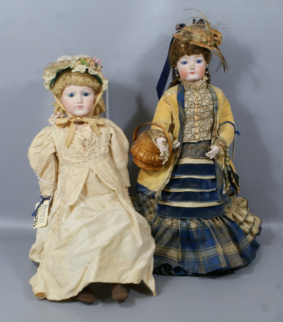 Appraisal: Reproduction French Fashion Dolls doll with colorful outfit meant to