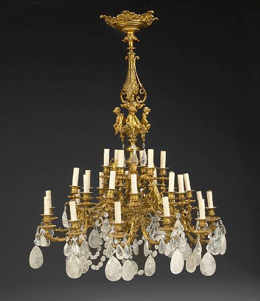 Appraisal: A R gence style gilt bronze thirty light chandelier The