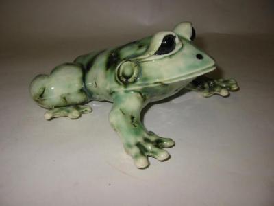 Appraisal: A STUDIO POTTERY MODEL OF A FROG modelled with scales