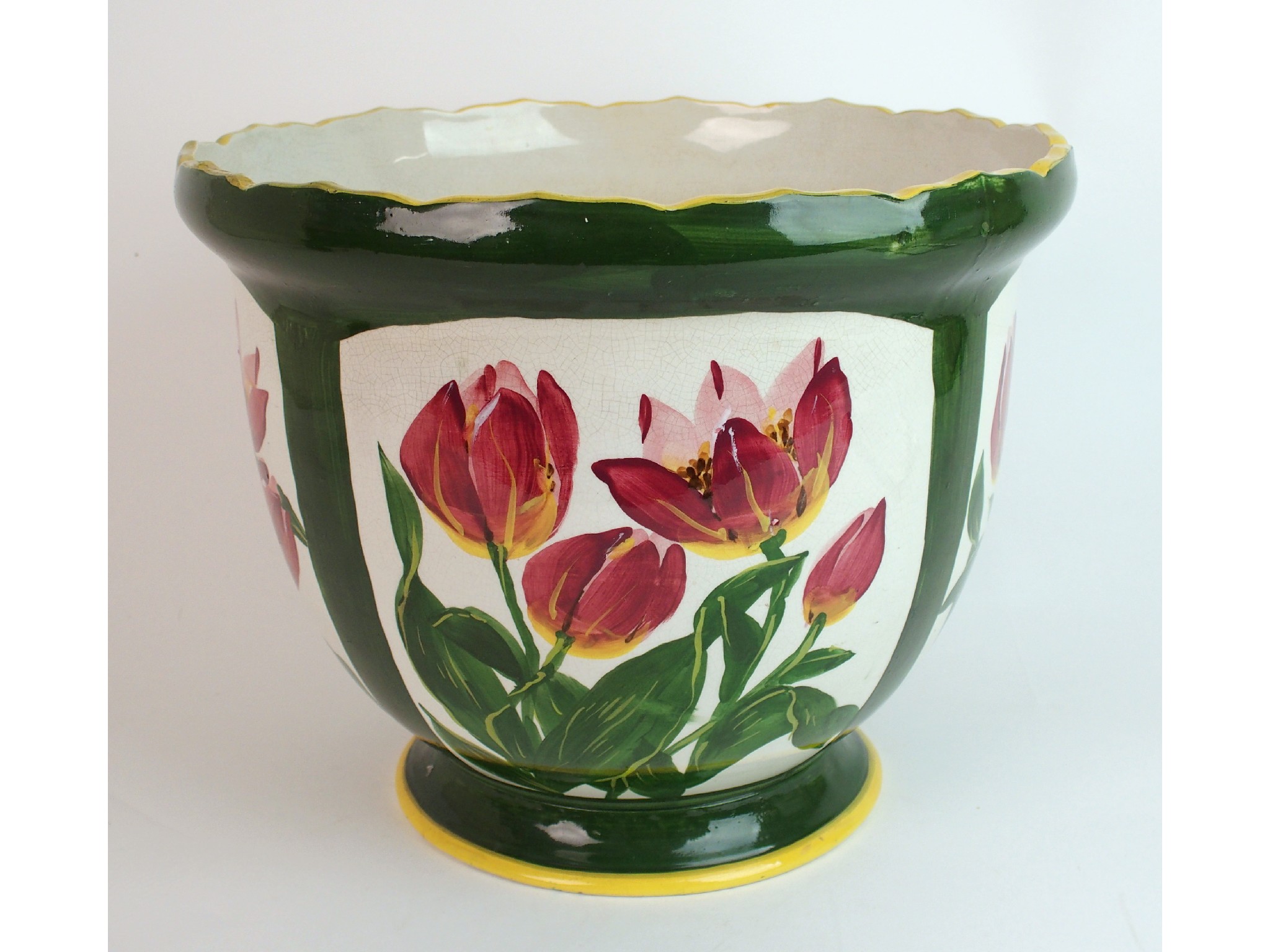 Appraisal: A Wemyss Ware jardiniere painted with panels of tulipsthe large