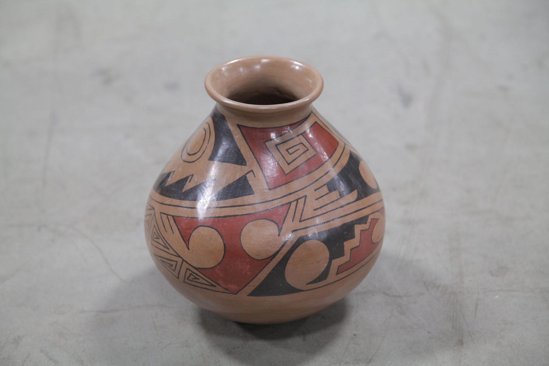 Appraisal: AMERICAN INDIAN POT Southwestern th century Red clay pot with