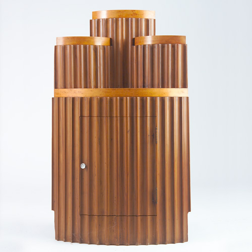 Appraisal: ART DECO Fluted corner cabinet of stepped form with single