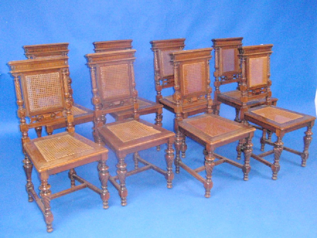 Appraisal: A set of eight continental walnut dining chairs with caned