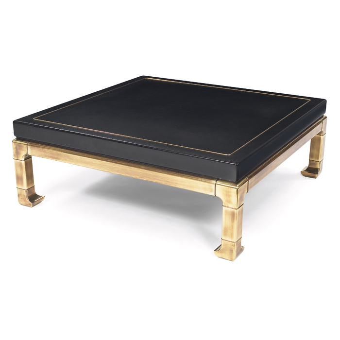 Appraisal: Mastercraft coffee table USA brass frame supports a textured black