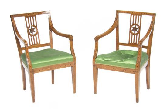 Appraisal: A Pair of Hepplewhite Style Armchairs having five rung pierced