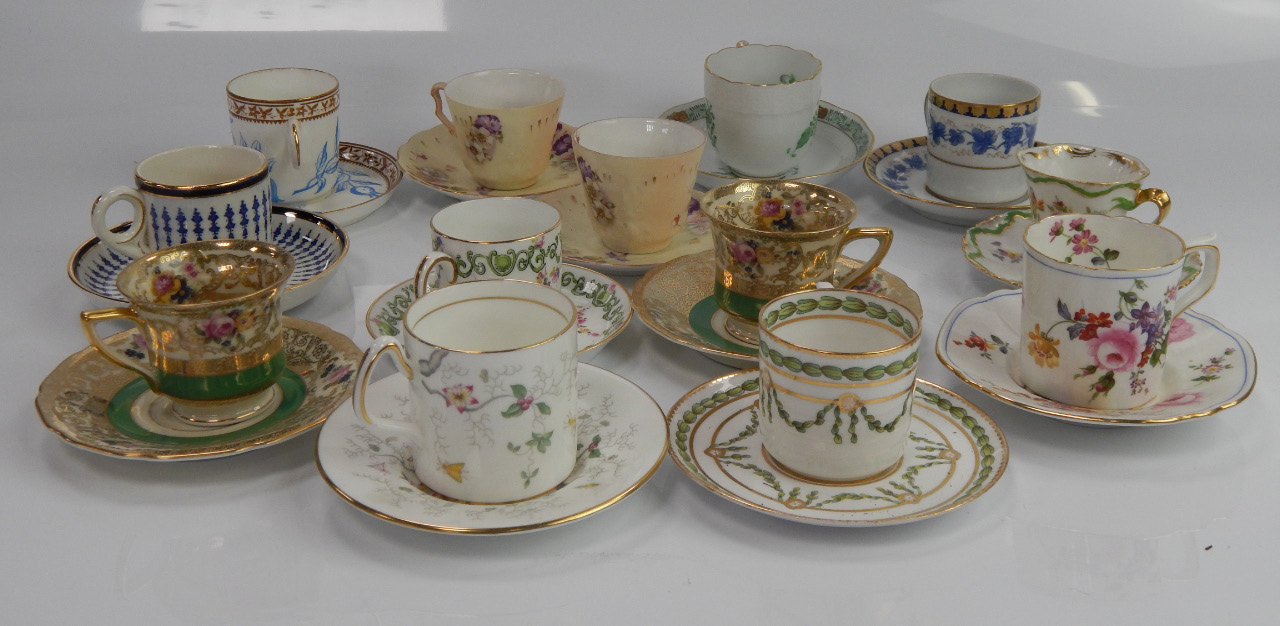 Appraisal: Porcelain coffee cans and cabinet cups and saucers tray