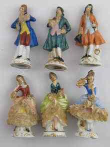 Appraisal: A set of six ceramic menu holder figures three ladies