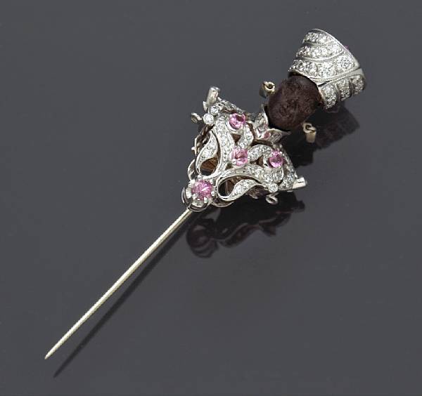 Appraisal: A diamond pink sapphire and ebony blackamoor stickpin A Nardi