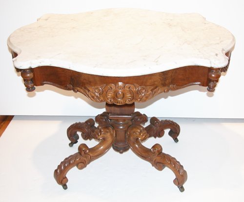 Appraisal: Artist Title Rococo Revival Style Carved Walnut Table with Marble