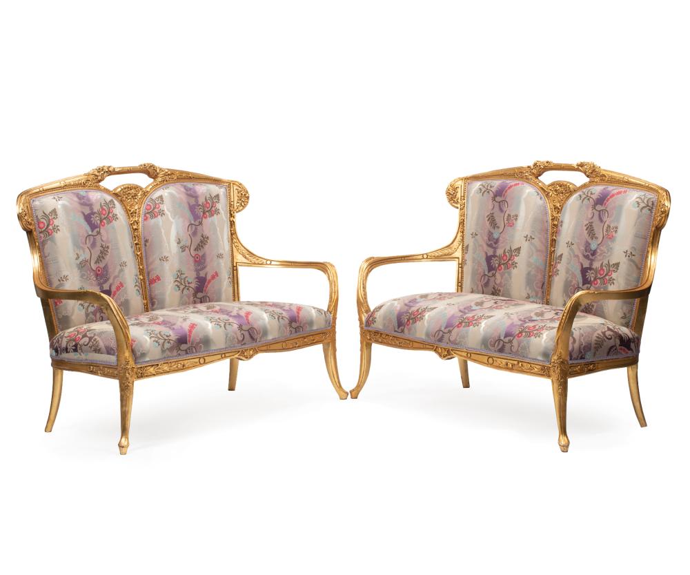 Appraisal: Pair of Art Nouveau-Style Carved and Gilt Wood Settees divided