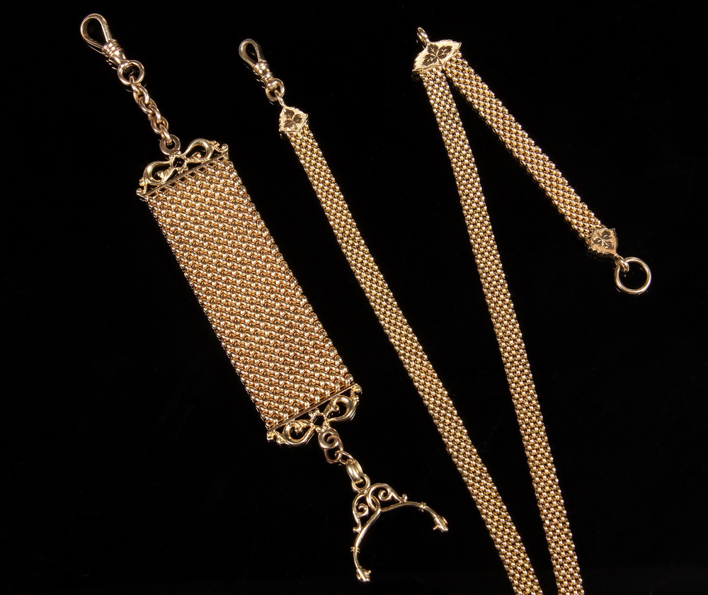 Appraisal: WATCH CHAINS - Two K watch chains circa - including