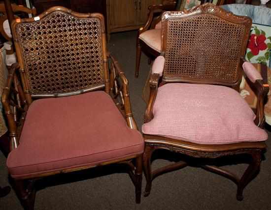 Appraisal: Pair of Louis XV style carved walnut cane-seat armchairs and