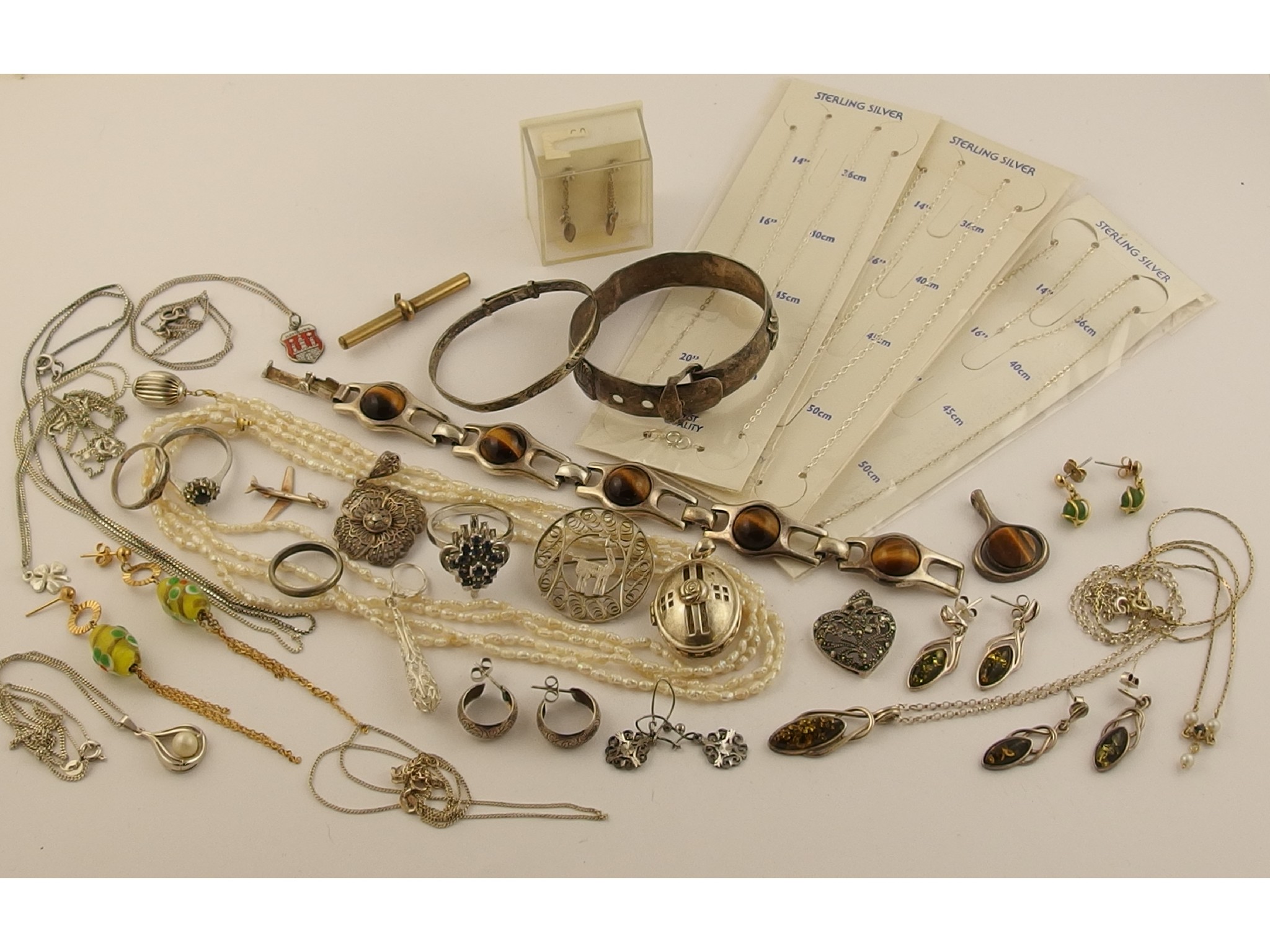 Appraisal: A collection of silver and costume jewellery to include a