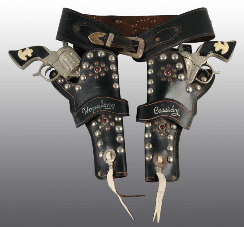 Appraisal: Hopalong Cassidy Toy Double Gun Holster Set Description By Wyandotte