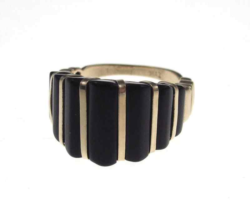 Appraisal: K HIGH PROFILE ONYX RING K yellow gold ring contains