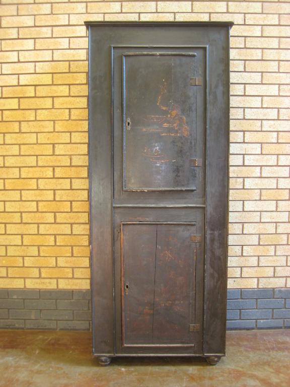 Appraisal: An th Century lacquered Cupboard with two solid panelled doors