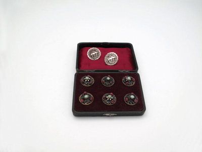 Appraisal: A set of six silver-gilt enamel and hard stone buttons