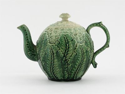 Appraisal: A creamware cauliflower teapot and cover the lid and shoulders