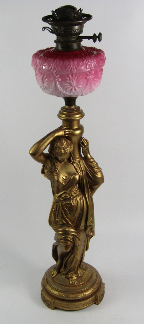 Appraisal: A Victorian gilt metal figural oil lamp H J Gardner