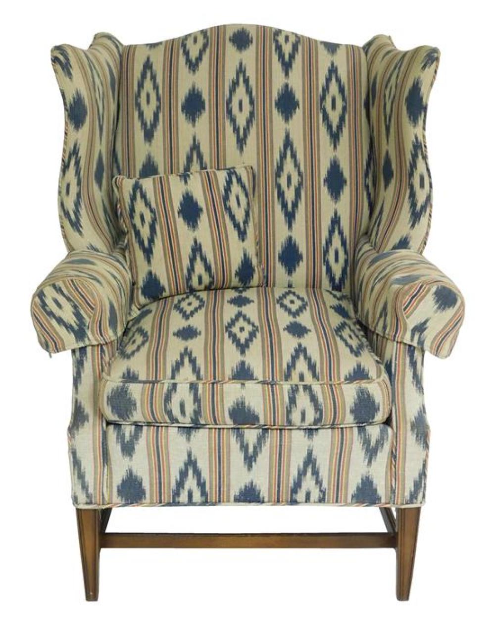 Appraisal: Wing chair with blue and cream striped ikat fabric th