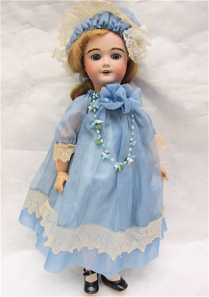 Appraisal: LIMOGES FABRICATION FRANCAISE BISQUE HEAD DOLL with blue fixed eyes