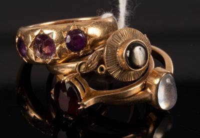 Appraisal: An amethyst three-stone ring set in ct gold size L