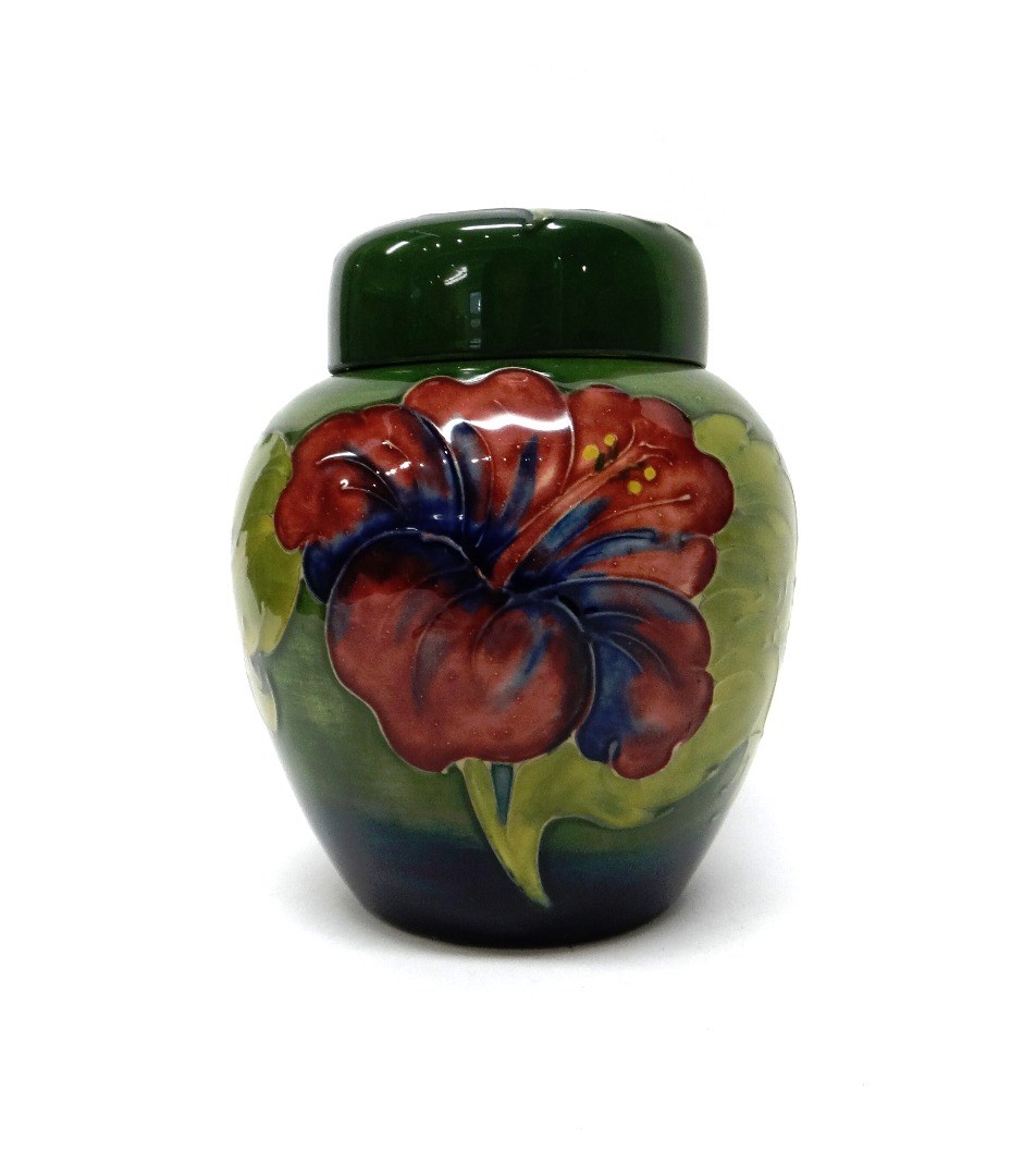 Appraisal: A Moorcroft 'Hibiscus' green ground ginger jar and cover mid