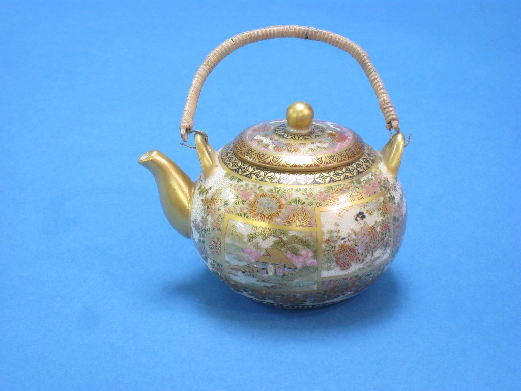 Appraisal: A Japanese miniature Teapot finely painted reserves of figures and