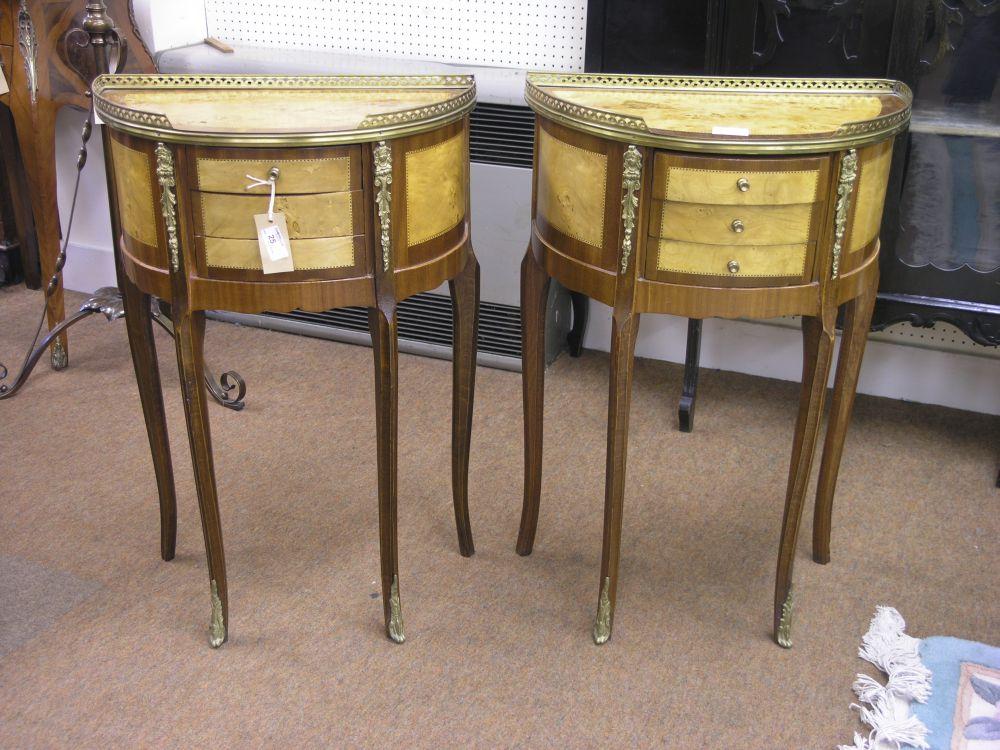 Appraisal: A pair of French reproduction demi-lune side tables Transitional style