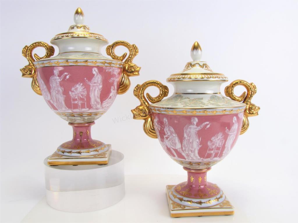 Appraisal: A pair of lidded porcelain urns body decoration in Pate-sur-Pate