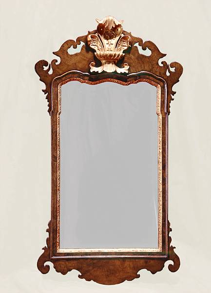 Appraisal: A pair of George II style parcel gilt walnut mirrors