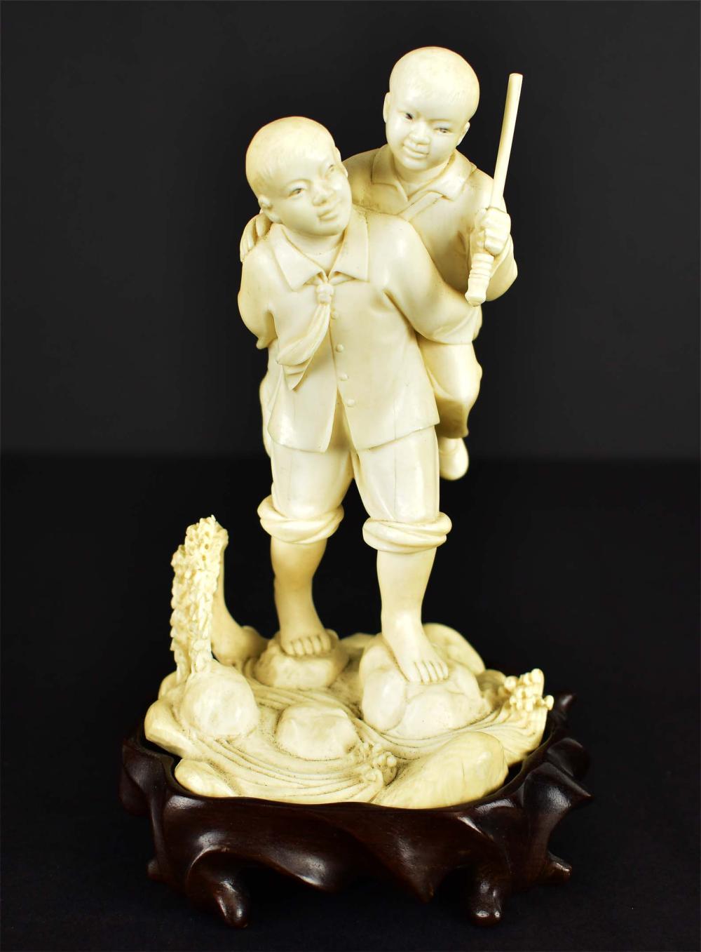 Appraisal: CHINESE REPUBLIC PERIOD FIGURAL GROUPDepicting two brothers crossing a stream