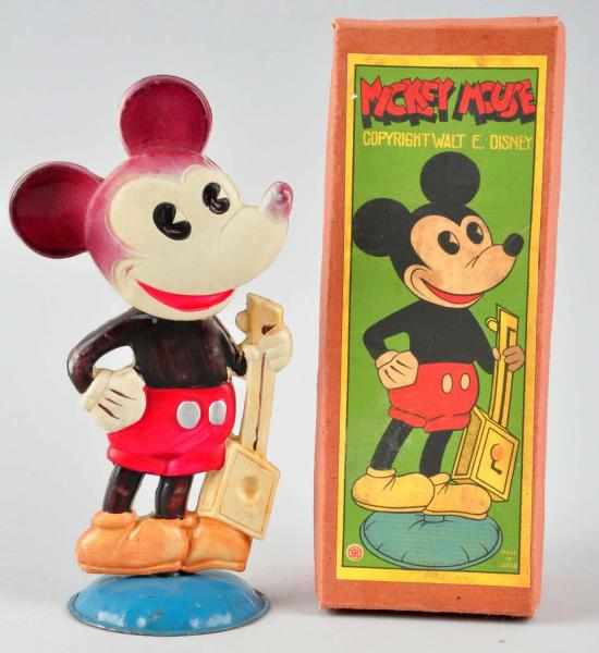 Appraisal: Celluloid Disney Mickey Mouse Nodder Toy Description Circa s Swinging