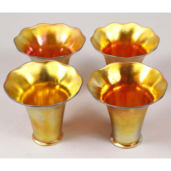 Appraisal: Art Nouveau iridescent gold art glass shades set of four