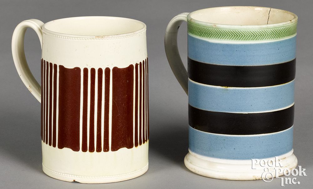 Appraisal: Two mocha mugs with vertical brown bands Two mocha mugs