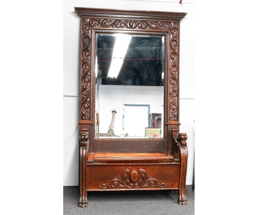 Appraisal: Massive Victorian oak carved hall seat circa with beveled glass