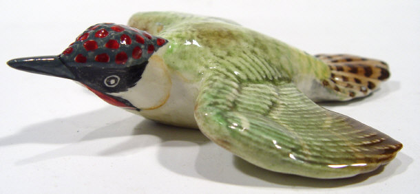 Appraisal: Small Beswick woodpecker wall plaque with hand painted decoration paper