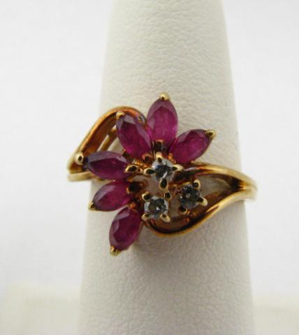 Appraisal: K Yellow Gold floral design ring with six rubies as