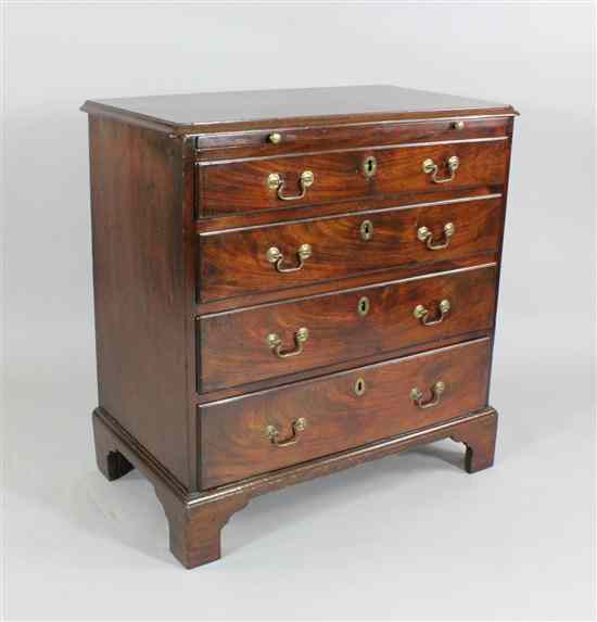 Appraisal: A George III mahogany chest with brush slide and four