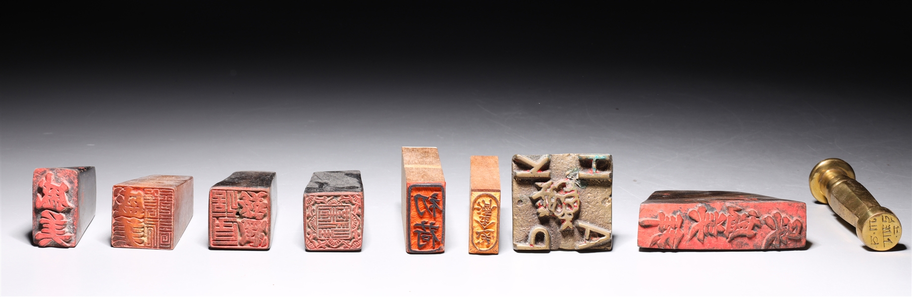 Appraisal: An assortment of nine seals from various countries in Chinese