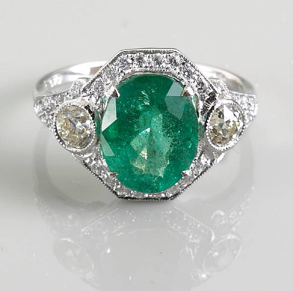 Appraisal: An emerald and diamond ring oval-cut emerald weighing an estimated