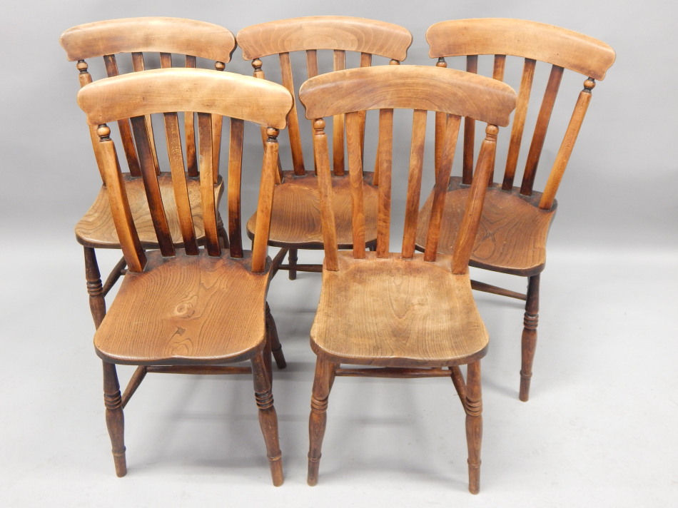 Appraisal: An associated set of five slat back Windsor side chairs