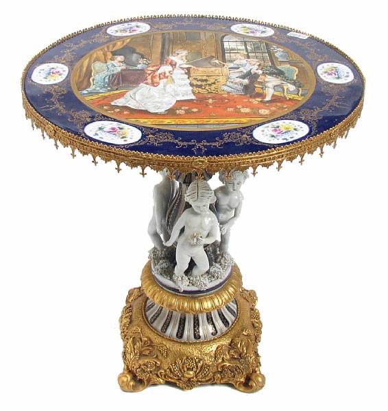 Appraisal: A Louis XV style porcelain table with bronze mounts height