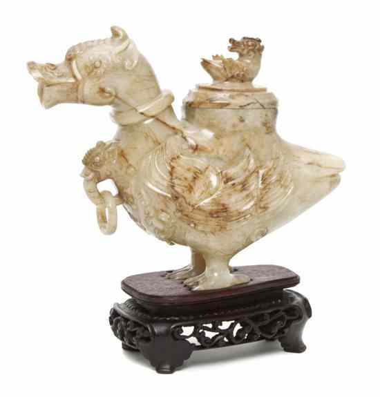 Appraisal: A Chinese Carved Hardstone Duck the animal depicted in an