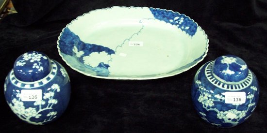 Appraisal: A blue and white oval meat dish with foliate decoration