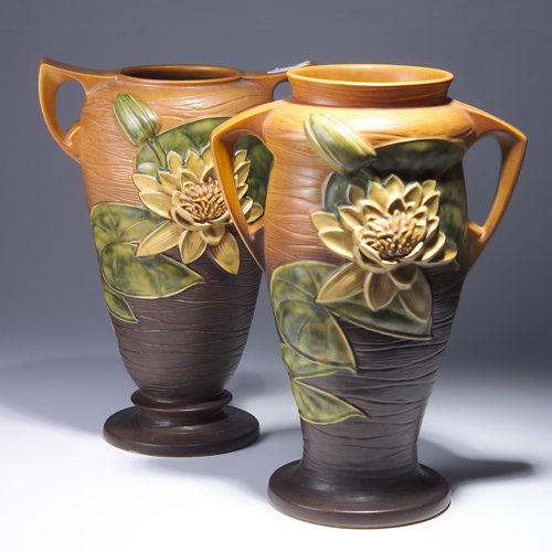 Appraisal: Two ROSEVILLE brown Waterlily vases to include - as-is base