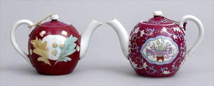 Appraisal: TWO RUSSIAN PORCELAIN SPHERICAL TEAPOTS AND COVERS The larger with