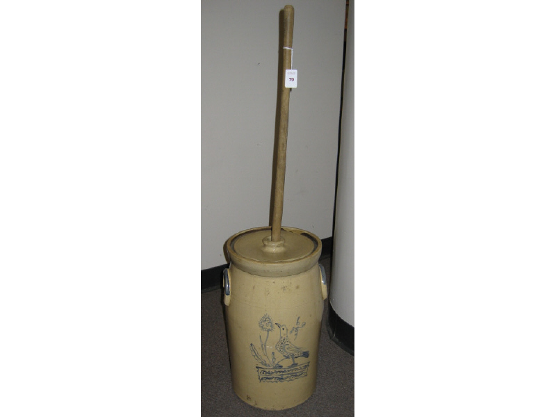 Appraisal: PRIMITIVE AMERICAN BUTTER CHURN Blue glaze on brown ground bird